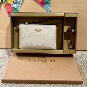 Coach Cream/Beige Wristlet with Gold Accents